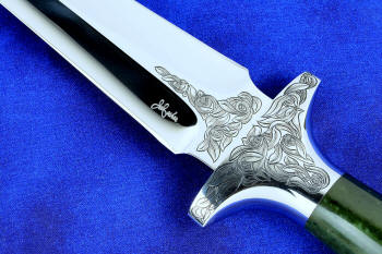 "Daqar" Custom handmade dagger, engraved stainless steel guard and maker's mark detail view ,  in T4 deep cryogenically treated CPM 154CM Powder metal technology martensitic stainless steel blade, hand-engraved, 304 austenitic stainless steel fittings, hand-engraved, nephrite jade gemstone handle, hand-carved leather sheath inlaid with American Bison skin