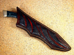 "Jungle Bowie" fine sheath inlaid with ostrich leg skin in 9 -10 oz. leather shoulder