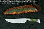 "Opere" Custom Knife, obverse side view in T4 cryogenically treated CPM 154CM powder metal stainless steel blade, 304 stainless steel bolsters, Nephrite Jade gemstone handle, hand-carved leather sheath inlaid with green rayskin